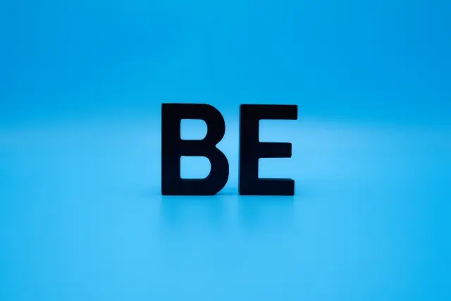 BE